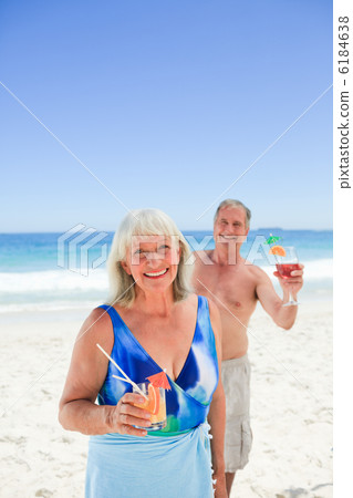 Radiant couple on the beach 6184638