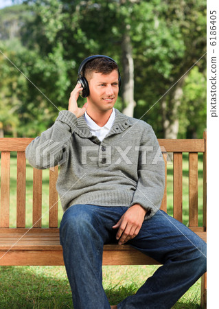 Relaxed man listening to some music 6186405