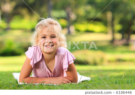 Little girl in the park Little girl in the park 6186446