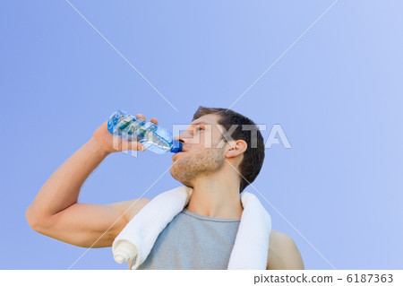 Man drinking water after the gym Man drinking water after the gym 6187363