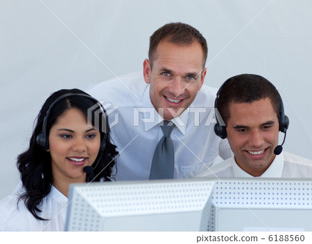 Manager and business people in a call canter Manager and business people in a call canter 6188560