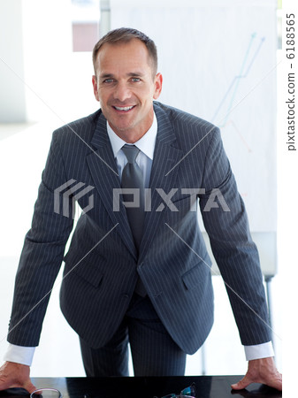 Senior businessman giving a presentation 6188565