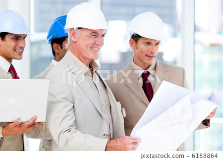 Architect team working on a building project Architect team working on a building project 6188864