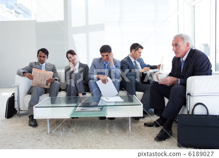 Business people sitting and waiting for a job interview Business people sitting and waiting for a job interview 6189027