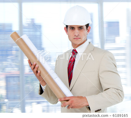 Handsome architect holding a blueprint 6189165