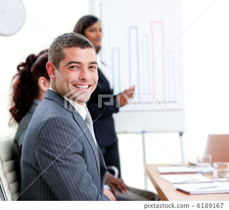 Self-assured young businessman at a presentation 6189167