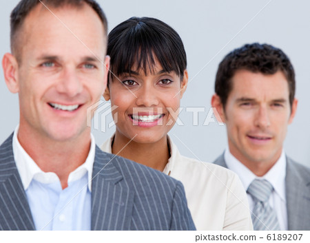 Confident business partners standing in a line Confident business partners standing in a line 6189207