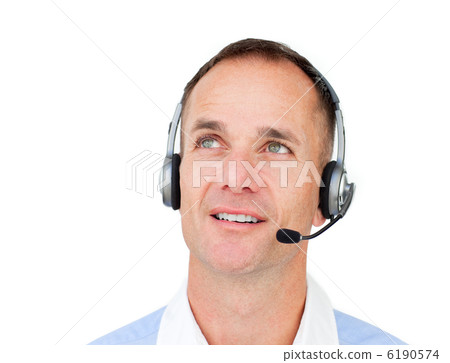 Attractive Customer service agent talking on headset Attractive Customer service agent talking on headset 6190574