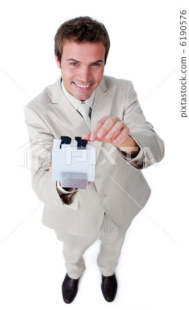 Attractive businessman searching for the index Attractive businessman searching for the index 6190576