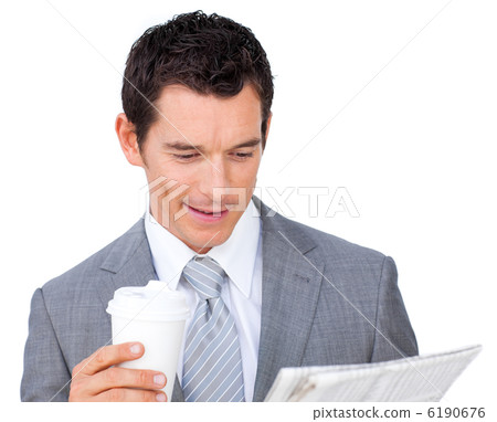 Businessman holding a drinking cup and reading a newspaper Businessman holding a drinking cup and reading a newspaper 6190676