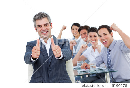 Cheerful business people celebrating a success Cheerful business people celebrating a success 6190678
