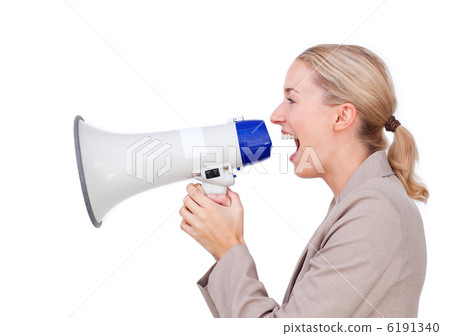 Assertive businesswoman yelling through a megaphone 6191340