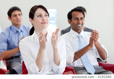 International business people clapping at a conference International business people clapping at a conference 6191880