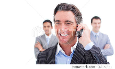 Smiling businessman talking on phone Smiling businessman talking on phone 6192040