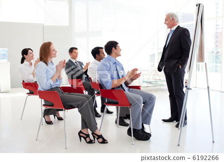 Senior businessman giving a conference 6192266