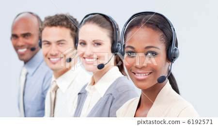 Smiling business team with headset on 6192571