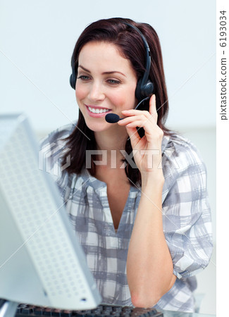 Caucasian smiling businesswoman with headset on Caucasian smiling businesswoman with headset on 6193034