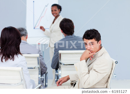 Bored businessman at a conference 6193127