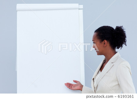 Afro-american businesswoman giving a presentation Afro-american businesswoman giving a presentation 6193161