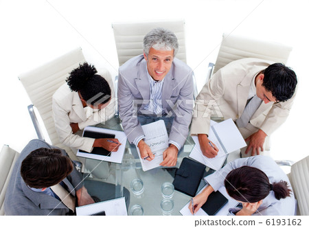 A diverse business group in a meeting A diverse business group in a meeting 6193162