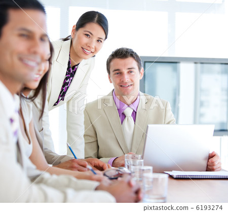 Multi-ethnic business team in a meeting Multi-ethnic business team in a meeting 6193274