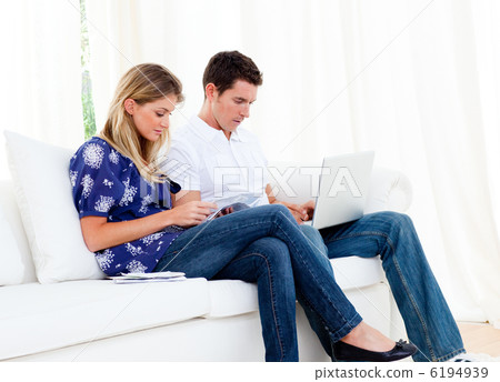 Young couple working at home Young couple working at home 6194939