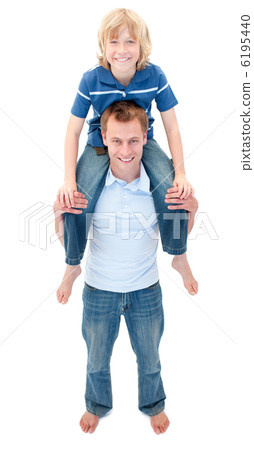 Portrait of father giving his son piggyback ride Portrait of father giving his son piggyback ride 6195440