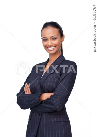Smiling businesswoman with folded arms Smiling businesswoman with folded arms 6195764