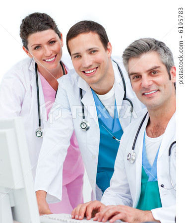 Positive medical team working at a computer Positive medical team working at a computer 6195783