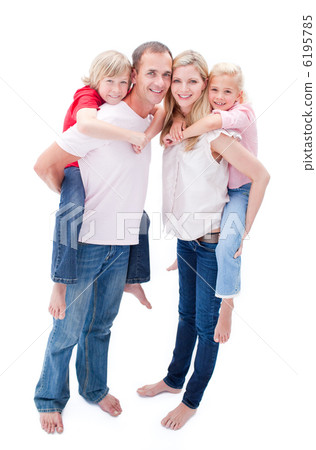 Attentive parents giving their children piggyback ride Attentive parents giving their children piggyback ride 6195785
