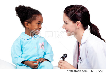 Smiling little girl attending medical check-up 6196551