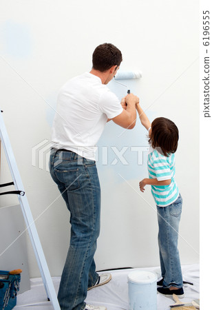 Caring father teaching his son how to paint Caring father teaching his son how to paint 6196555