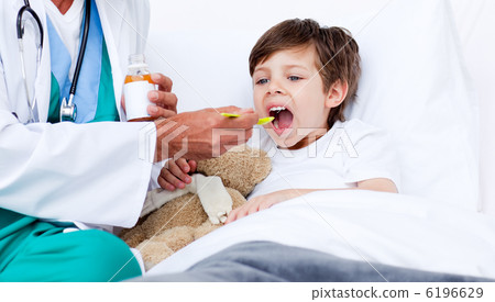 Little boy taking cough medicine Little boy taking cough medicine 6196629