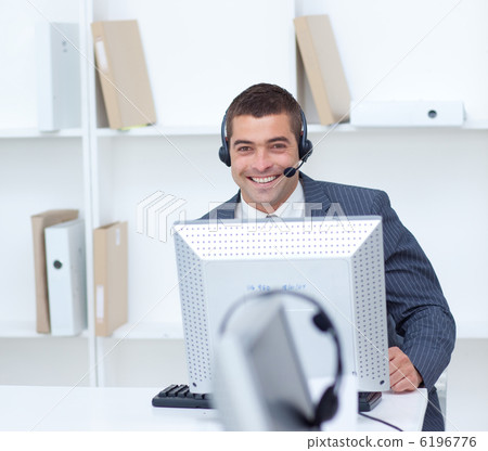 Businessman working in a call center 6196776