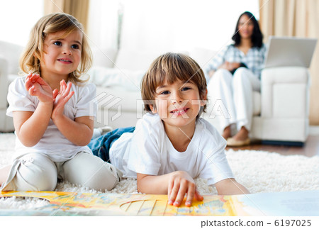 Jolly siblings eating chips and drawing Jolly siblings eating chips and drawing 6197025