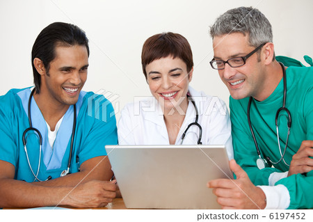 Group of doctors in a meeting Group of doctors in a meeting 6197452