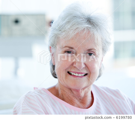 Portrait of a senior woman in a hospital 6199780