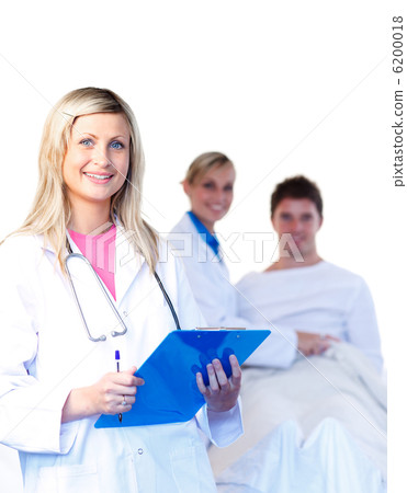 Beautiful young doctors with a patient Beautiful young doctors with a patient 6200018