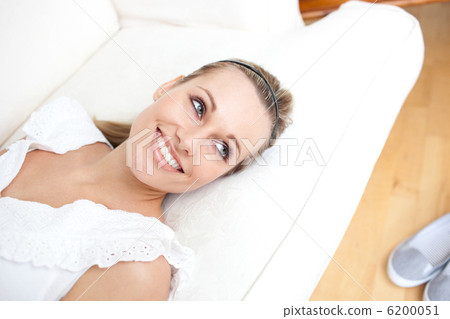 Portrait of a charming woman relaxing Portrait of a charming woman relaxing 6200051