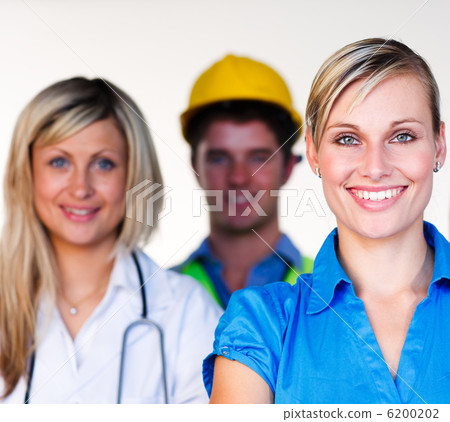 Doctor, businesswoman and architect smiling at the camera Doctor, businesswoman and architect smiling at the camera 6200202