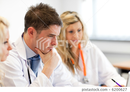 Team of doctors at a meeting 6200627