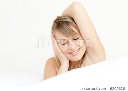 Portrait of a charming woman waking up Portrait of a charming woman waking up 6200628