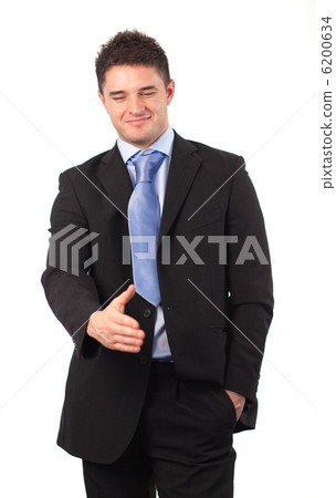 Businessman offering a handshake Businessman offering a handshake 6200634