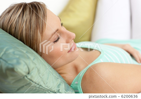 Portrait of a tired woman relaxing 6200636