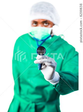 Surgeon holding a stethoscope Surgeon holding a stethoscope 6200638