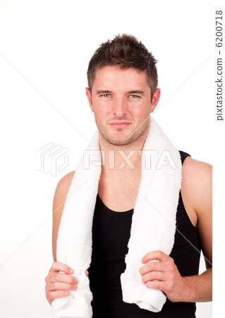 young athlethic man with a towel around him young athlethic man with a towel around him 6200718