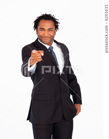 Friendly businessman pointing at the camera 6201635
