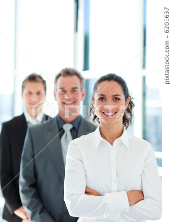 Smiling businesswoman with folded arms in a line 6201637