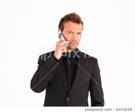 Young businessman using a cell phone Young businessman using a cell phone 6201639