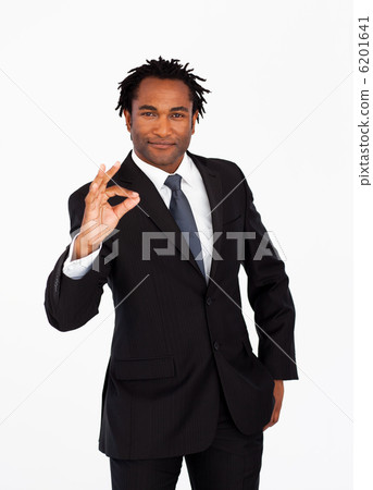 Serious  businessman showing okay sign 6201641